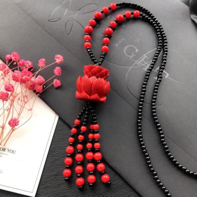 Collier Porte-bonheur Fleur En Cinabre Rouge Et Noir - 51 Cm - Bijou Ethnique Femme