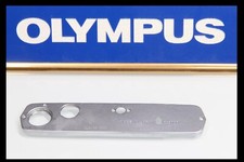 209673 OLYMPUS OM-1 CHROME BOTTOM COVER REPAIR PART USED OM1 OM 1
