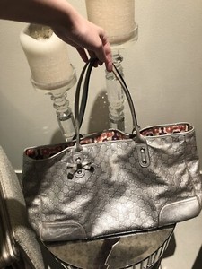 silver metallic handbag