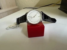 NOS Unisex Tissot  white dial black leather band Watch T0522101603700