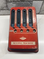 Vintage 1940's mechanical Wolverine Tin Toy Adding Machine Pull Dial Calculator