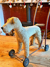 Vintage 1950s English Merrythought pull/push along mohair terrier dog on wheels