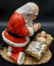 Vintage Kneeling Santa with Jesus By Roman Inc. Made in 1983 Numbered 7570/19500