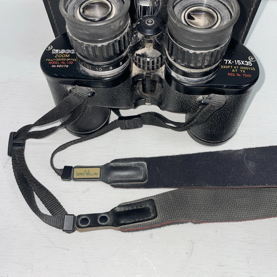 Vintage Tasco Binoculars Zoom Fully Coated Optics Model No. 100  7X-15X35 330’ - Image 2 of 4
