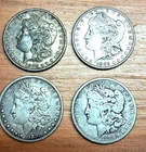 4 MORGAN SILVER DOLLARS