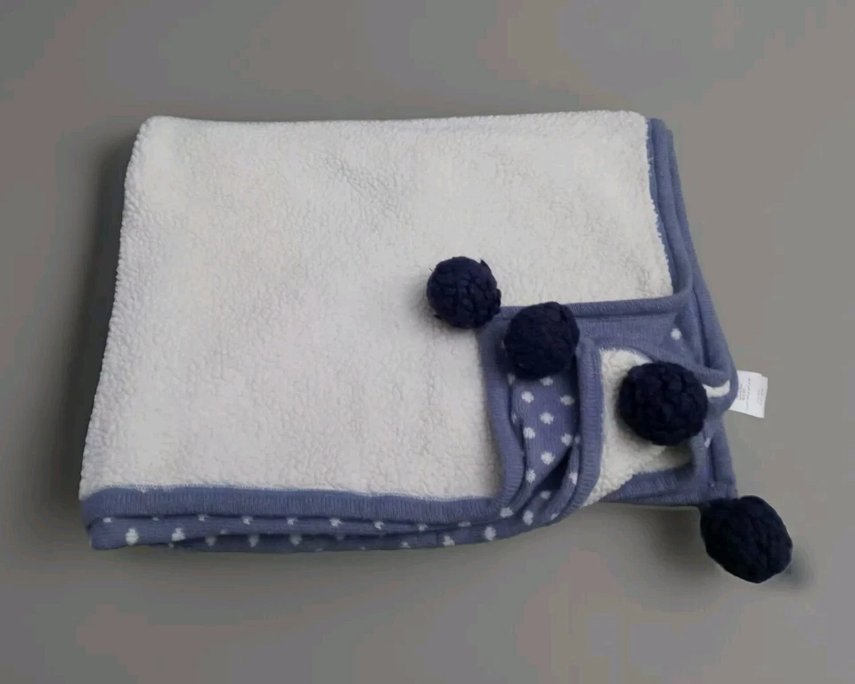 Manta polar tejida con cable pompón lunares Pottery Barn Kids PBK Foto 3 de 4