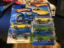 Hot Wheels First Edition 1970 Plymouth Superbird & HW Workshop & Muscle Mania