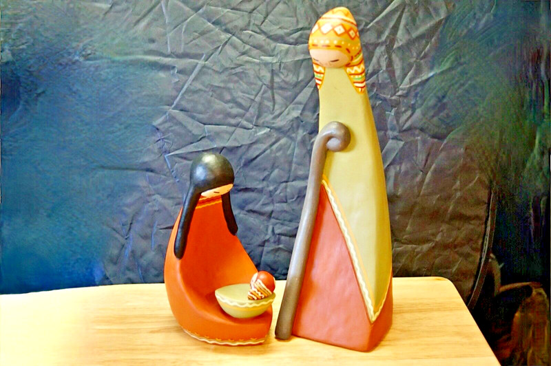 Vintage heavy Peruvian hand painted clay scuptures.