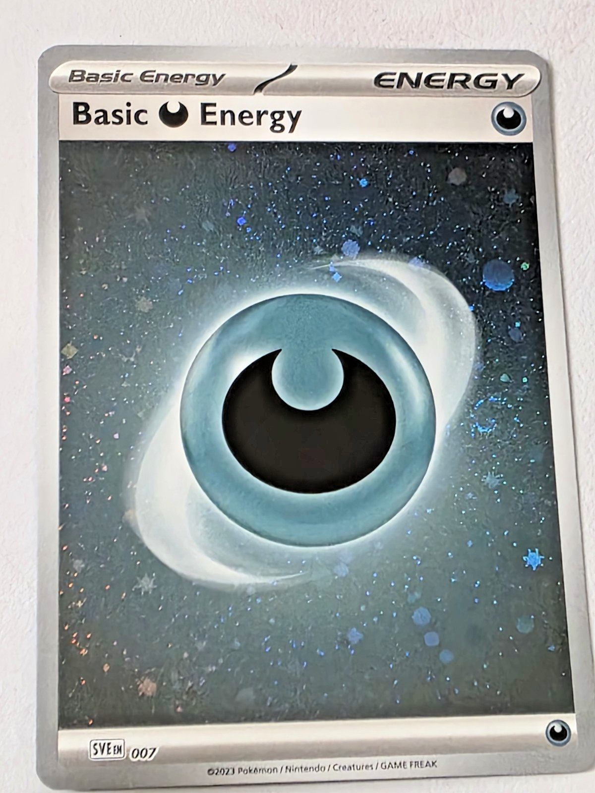 Basic Darkness Energy Cosmos Holo with Swirl SVE 007 Pokemon TCG