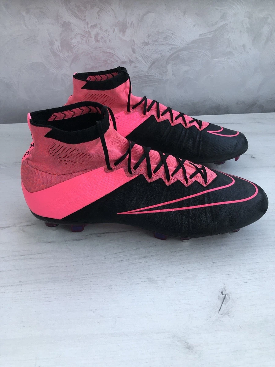 Pink and black store nike boots