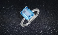 4.00 CTTW Lab Created  Blue Topaz Emerald Cut Sterling Silver Ring Sizes 6 - 9