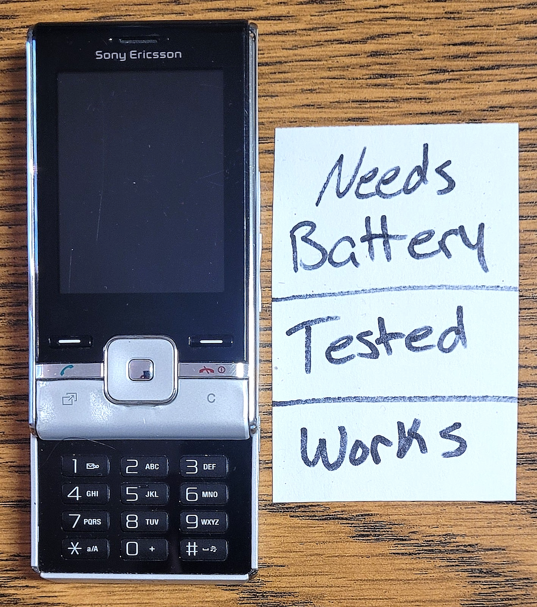 Sony Ericsson T715 - Silver ( Unlocked ) Very Rare Slide Phone