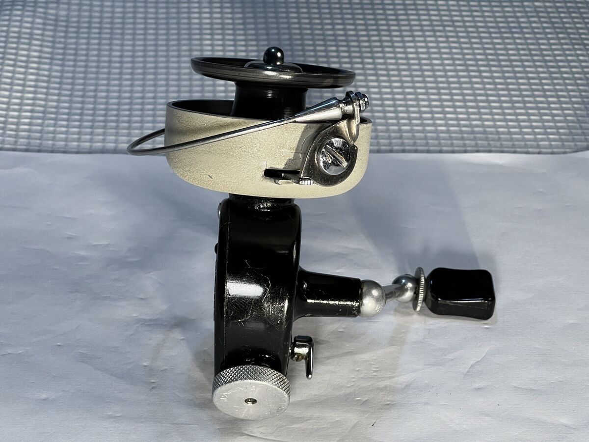 ABU 444 Vintage Spinning Reel Black Satin & Off-White Bezel ABU 444 Vintage Spinning Reel Black Satin & Off-White Bezel