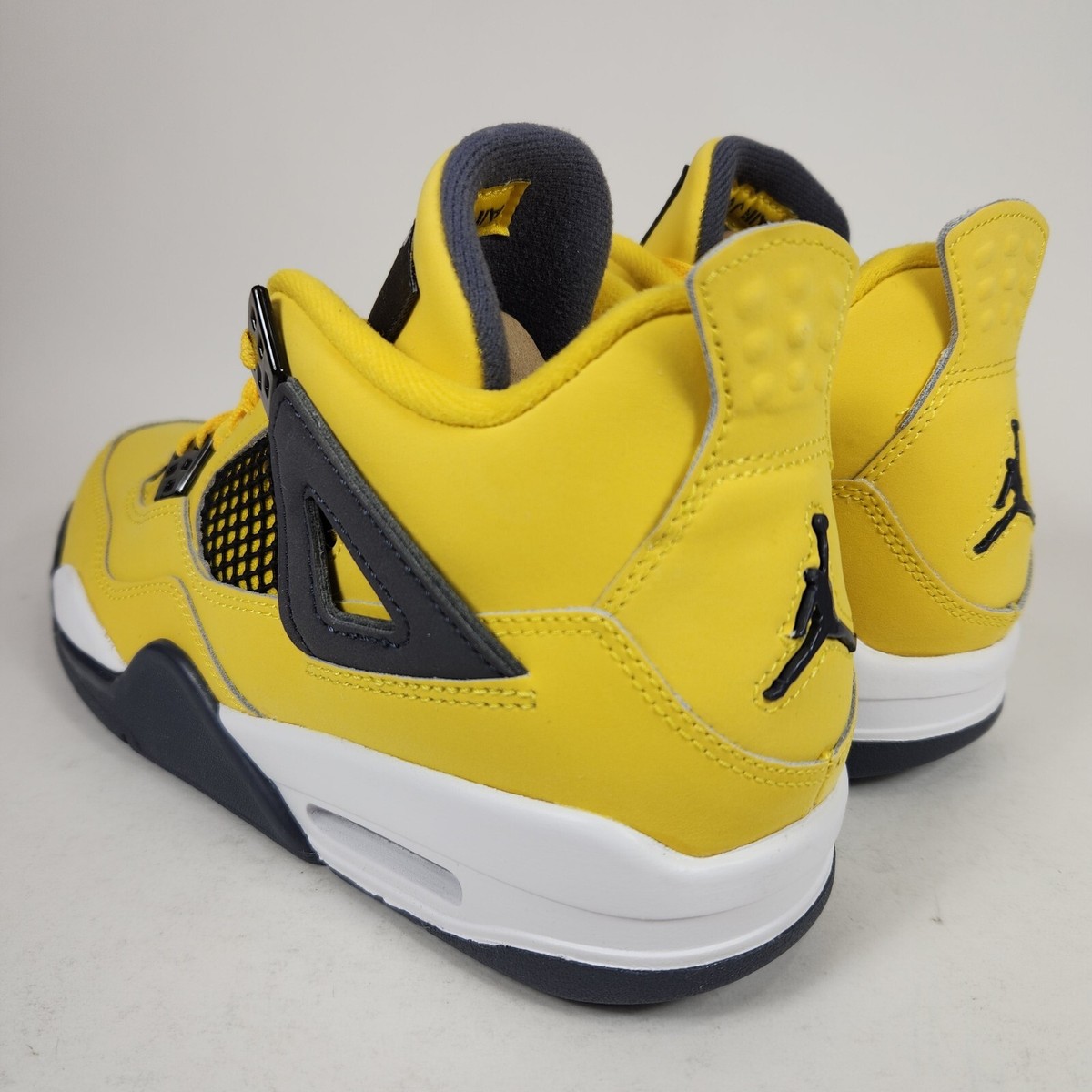 Air Jordan 4 ネイビー/イエロー Nike Air Jordan 4 Retro GS Size 7Y, Womens 8.5 Lightning