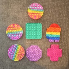Lot of 7 Pop It Fidget Sensory Toys Assorted Shapes Rainbow Solid Colors