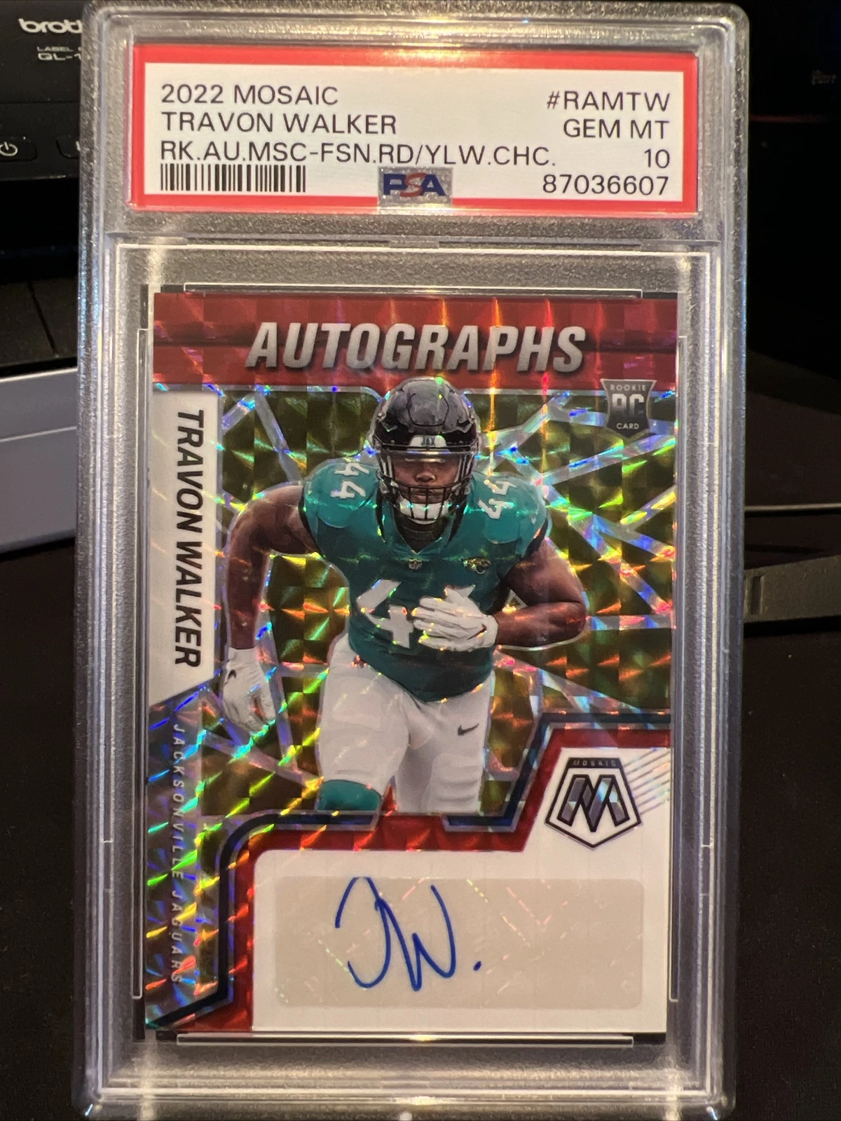 Travon Walker Panini Mosaic Rookie Autograph Mosaic #RAMTW Fusion Red/Yellow Choice