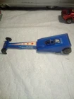 hot wheels redline rear engine mongoose dragster has damaged front wheel