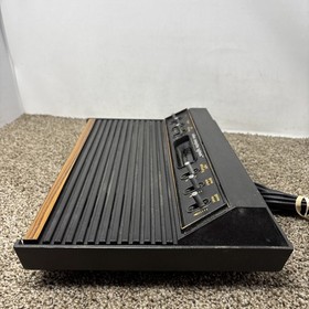 Atari 2600 System Bundle with Console, 30 Games, Joystick, Paddles, and More LOT
