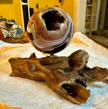 Fantastic carnelian red crystal sphere with natural wooden stand Free shipping!