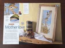 Tableau point de croix bébé girafe et mère girafe **d'un magazine**