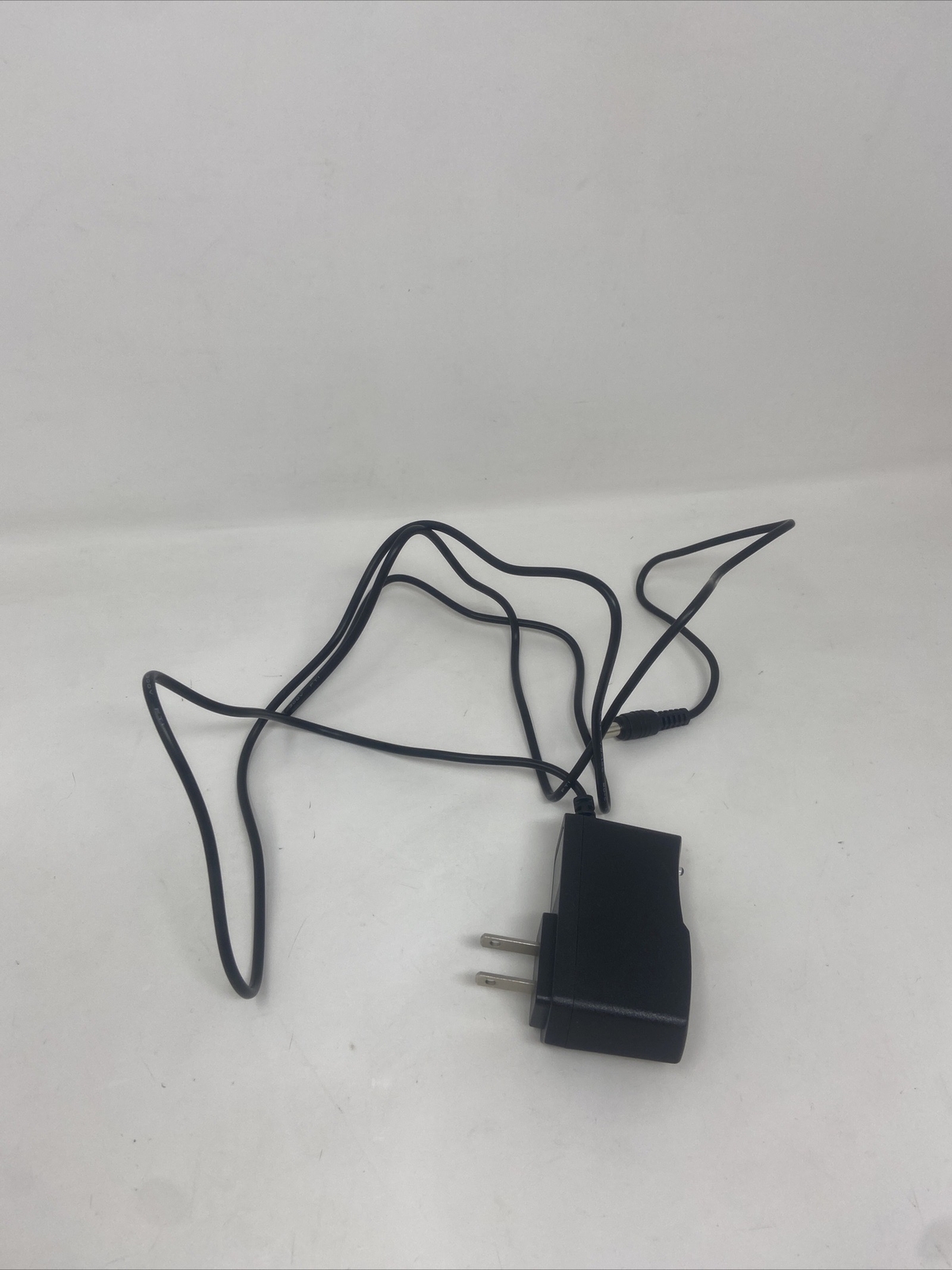 AC/DC Adaptor 12V 1A Model 1210 Wall Power Supply 100240VAC 50/60Hz 64