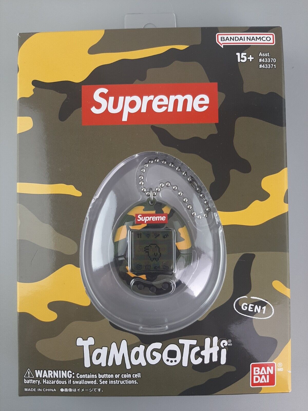 New In Box SUPREME TAMAGOTCHI YELLOW CAMO Gen 1 Bandai Namco SS 2023 Week 4  Drop