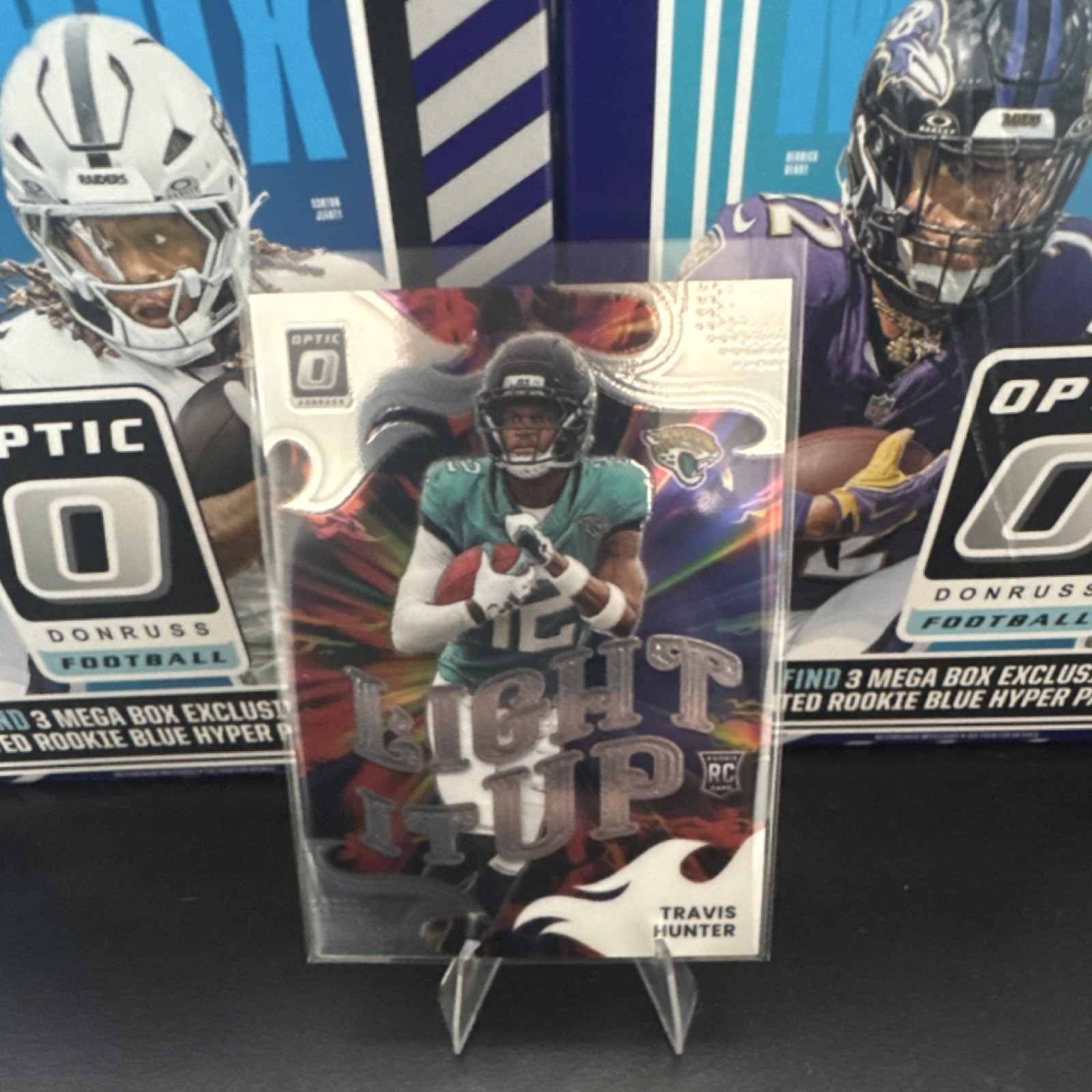 Panini 2025 Donruss Optic Travis Hunter Rookie Insert Light It Up #4 Jaguars