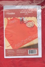 NIP  STAMPED CROSS STITCH KIT SCROLLING HEARTS APRON