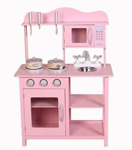 pink toy wooden kitchen