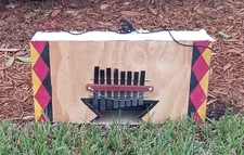 Sierra Leone-style "thumb piano" (kongoma): large