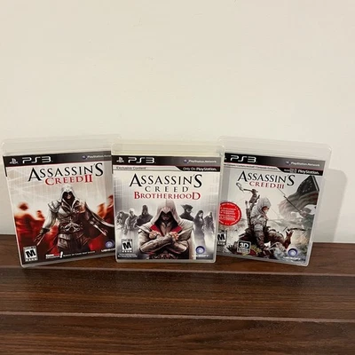 Assassin's Creed PS3 Lot: II, III, & Brotherhood | Excellent Cond. & Complete - Image 1 of 4