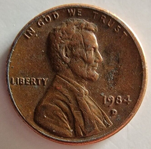 Penny-1984 D Lincoln Cent Error line in the head