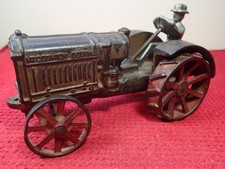 Vintage 1930  s Arcade Cast Iron McCormick Deering Toy Tractor 7 1/2 Inches Long