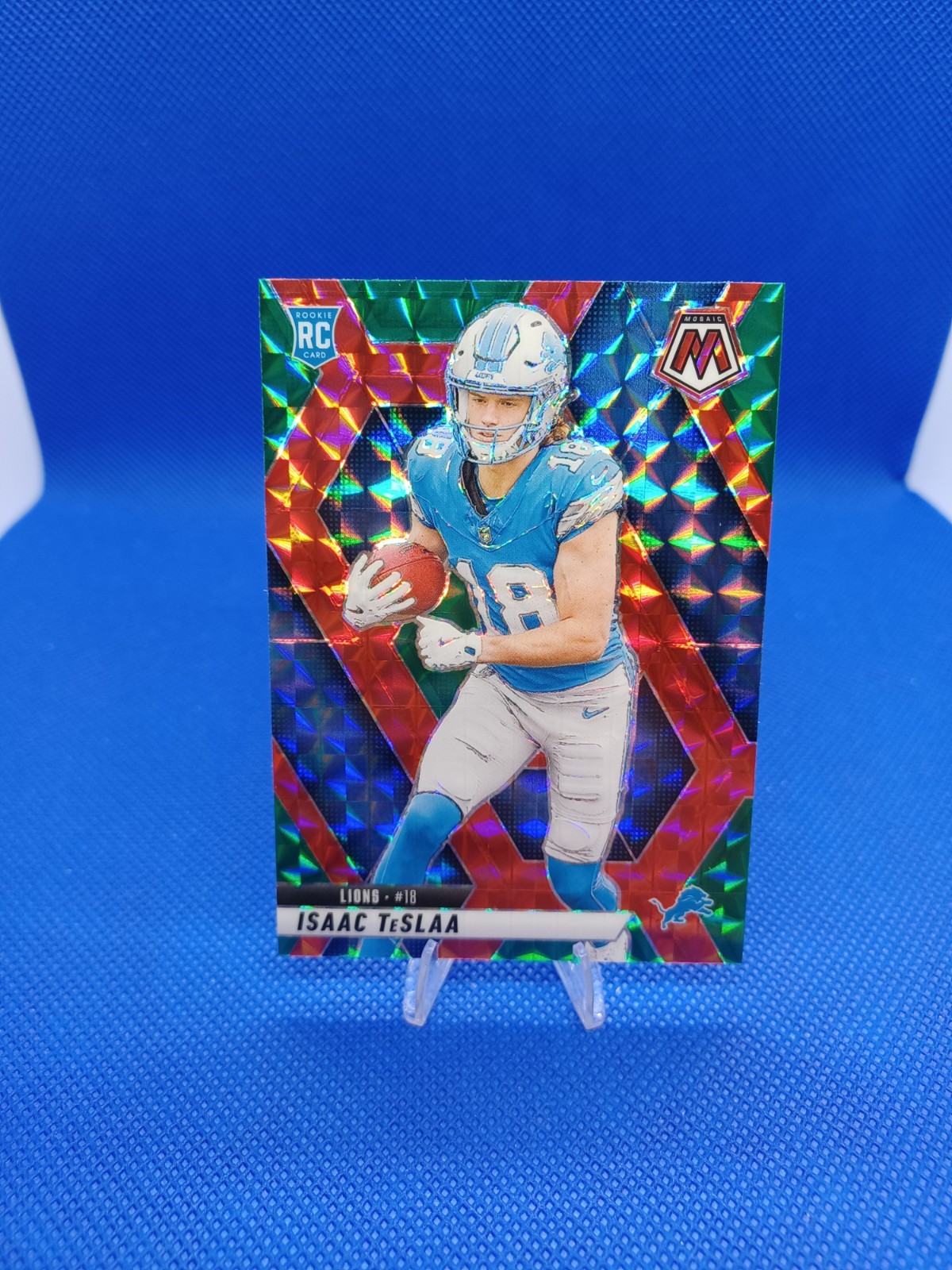 2025 Panini Mosaic Isaac Teslaa #319 RC Rookie Choice Prizm Red Green Lions