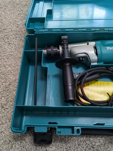 Taladro percutor Makita HP2050 6,6 Amp 3/4" con cable reparación certificada por Makita - Imagen 8 de 11
