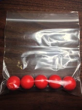 Five 1" Solid Red polypropylene precision bearing balls
