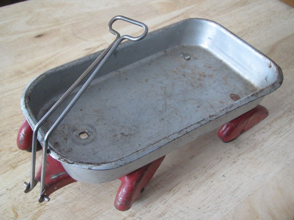Antique Wyndotte toy wagon from 20's wood wheels with streamlined fender covers