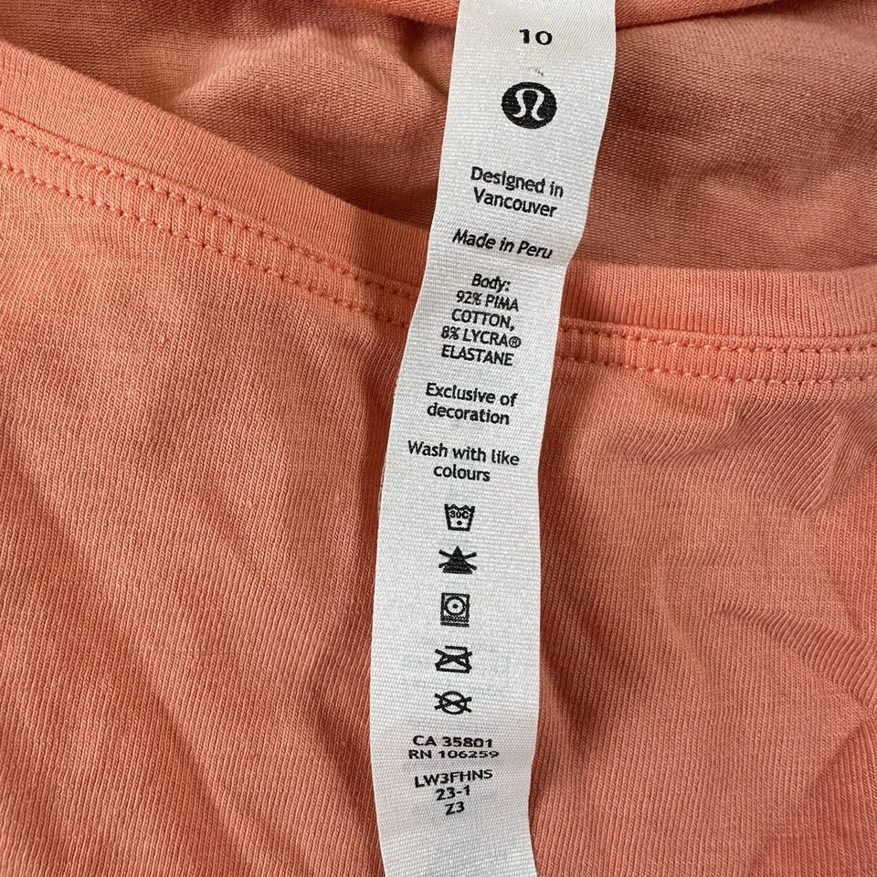 Camiseta Lululemon Back in Action Manga Corta Algodón Coral Talla 10 Calce Relajado Foto 3 de 4