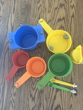 Vintage Mattel Disney Pots N  Pans Band set with measuring cups and spoons.