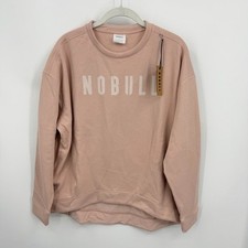 NOBULL Women's Legacy Crew Sweatshirt in a light pink/rose sz L