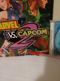 Marvel vs. Capcom 2, videogame w/manual & strategy guide book. sega dreamcast.