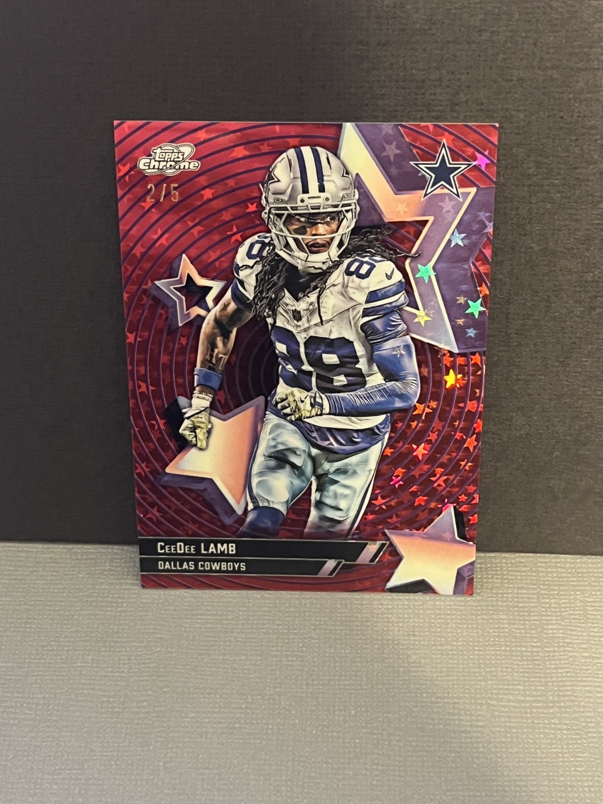 CeeDee Lamb #SF-16 Football Cards 2025 Topps Cosmic Chrome StarFractor trading card — raw and PSA graded price guide