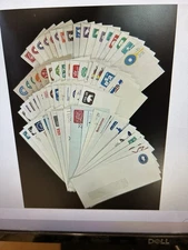 US all diff. lot of 64mint Embossed #10 Envelopes Postal Stationery 1930s-2008