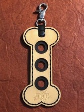 Dog Bone Joint Protector Holder. Nice item. Handy Item For Your Pool Cue Case