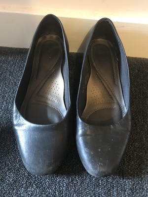 well worn used cabin crew shoes