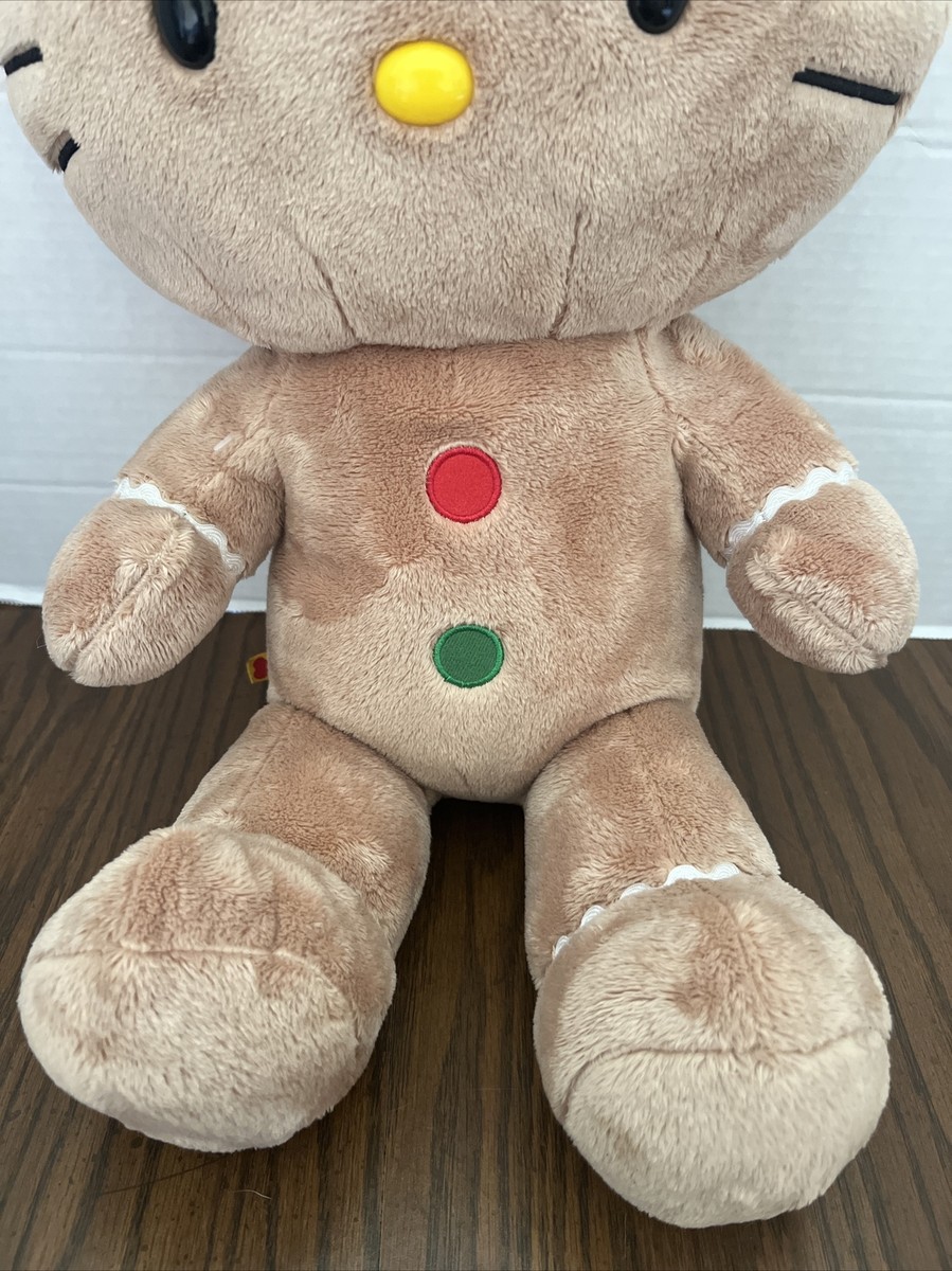 Sanrio Hello Kitty - Juego de juguetes de peluche de Navidad, paquete con felpa temática de pan de jengibre de Hello Kitty de 10 pulgadas y calcomanías, más | Muñeco de