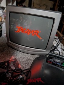 Atari Jaguar Console boxed with 2 controllers and 2 games manuals for everything