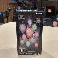 Disney World Land haunted mansion halloween graveyard busts string lights decor