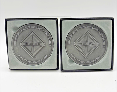 Set Of 2 International Truck and Engine Corporation Medallion or Paperweight