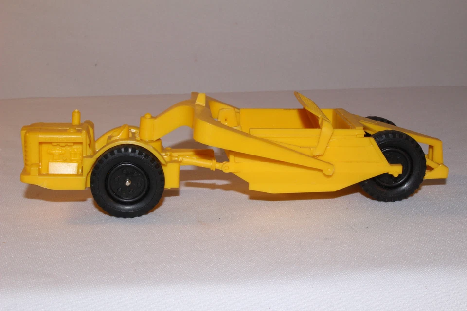 Raspador de plástico Allis-Chalmers años 60, bonito original Foto 2 de 4